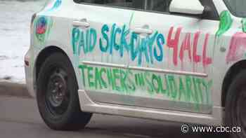 Education workers converge on Queen's Park in their cars to demand more support for families