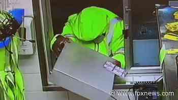 McDonald's drive-thru armed robbery caught on video as Maryland police look to ID suspect
