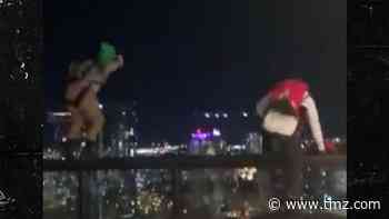 BASE Jumpers Leap from Nashville Hotel Roof Bar, Parachute Down
