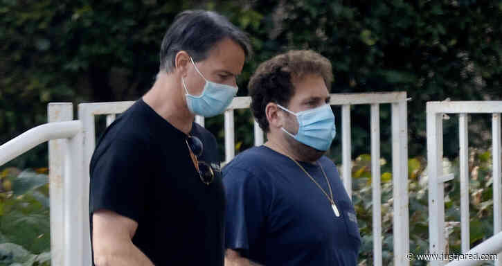 Jonah Hill Chats With a Friend While Taking His Dog for a Walk
