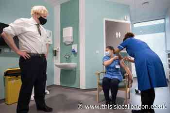 Boris Johnson visits Chase Farm Hospital during staff vaccinations