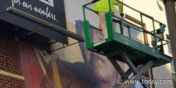 Community mourns after developer abruptly paints over mural of late activist