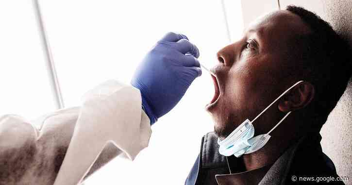 COVID vaccines "might not" work as well on South African strain, scientists warn - CBS News