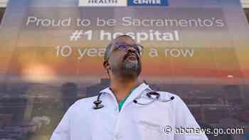 Black California surgeon 'walks the walk' on virus vaccine