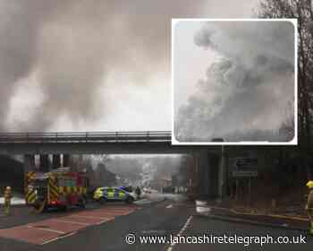 Grane road closed as 14 crews tackle major fire