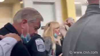 Lindsey Graham berated by angry Trump supporters at airport