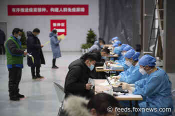 Chinese city of 11 million enters lockdown after coronavirus surge