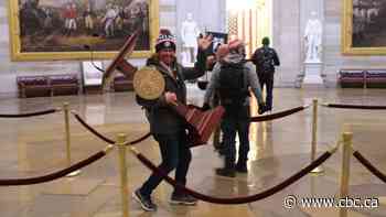 Man photographed carrying Pelosi's lectern during U.S. Capitol siege arrested