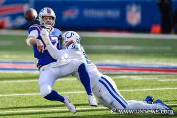 The Latest: Bills Beat Colts for First Playoff Win Since '95