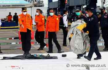 Indonesia rescuers find human remains after deadly plane crash