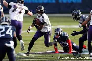 Lamar Jackson Gets Playoff Win, Ravens Beat Titans 20-13