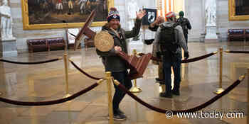 Man pictured carrying away Pelosi's lectern, two others charged in Capitol riot