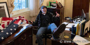 Man with foot up on desk in Pelosi's office at Capitol arrested