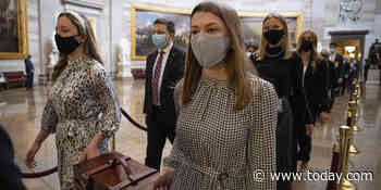 Woman pictured carrying electoral votes at the Capitol shares story behind photo