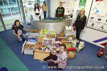 Homebuilder donates to St Rocco’s and Warrington Foodbank