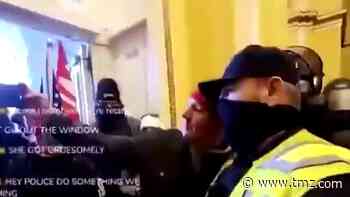Two Capitol Police Officers Suspended for Yukking It Up with Rioters