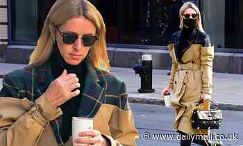 Nicky Hilton embraces her edgy side as she slips into a bold trench coat and combat boots around NYC