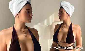 Kylie Jenner wears skimpy brown bikini as to promote skincare line