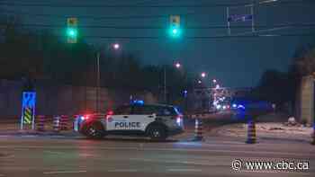 1 man in life-threatening condition after being struck by car in west end