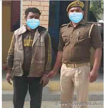 Indian police hastily photoshop face masks on picture of officer and arrested man