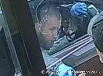 Man in CCTV sought by police following armed robbery at Lancashire Post Office