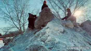 Piles of dirty snow are a Canadian kid's kingdom