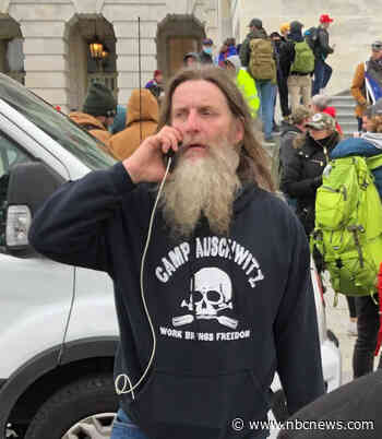 Man in 'Camp Auschwitz' shirt, photographed at U.S. Capitol riot, arrested in Virginia