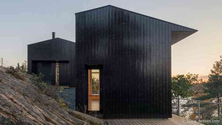 Jon Danielsen Aarhus designs spruce-clad holiday home overlooking the Oslofjord