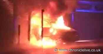 See firefighters tackle blaze after 'car driven into café and set alight'