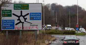 Vandals deface road sign with coronavirus conspiracy theory graffiti