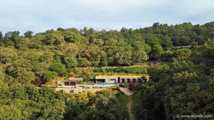 Giordano Hadamik Architects builds hillside Villa Nemes using stone excavated on site