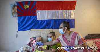 Karen couple become U.S. citizens in special private naturalization ceremony at St. Paul home