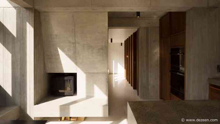 Concrete house extension in Dublin recreates feeling of "being a child under a very robust table"