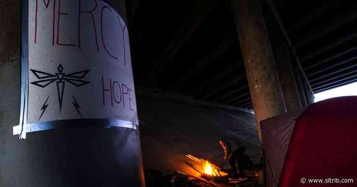 Under a Salt Lake City overpass, a new type of homeless encampment takes shape — but how long will it last?
