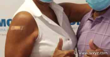 Detroit Medical Center begins administering COVID vaccine to patients 65+ - WXYZ