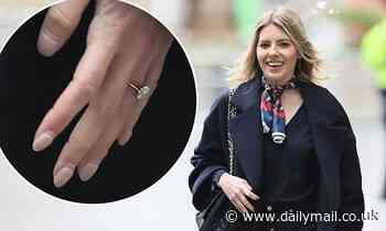 Mollie King flashes engagement ring as she arrives at Radio... after Stuart Broad proposed