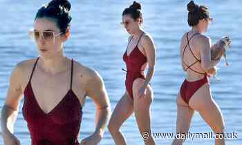Scout Willis rocks a red one-piece swimsuit while going for an early-morning beach trip in Malibu