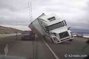 WATCH: Remember That Time the Wyoming Wind Blew a Semi Onto a Highway Patrol Car? - K2 Radio