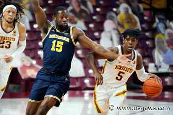 No. 23 Minnesota Hands No. 7 Michigan 1st Loss in 75-57 Romp