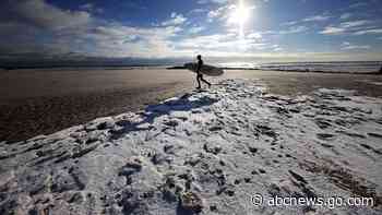 Heavy snow hits Northeast as California sees record heat, critical fire danger