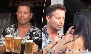 Steve Jacobs is the life of the party as he mingles with friends at trendy Bondi bar