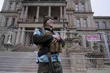 Protests start small at newly fortified US statehouses