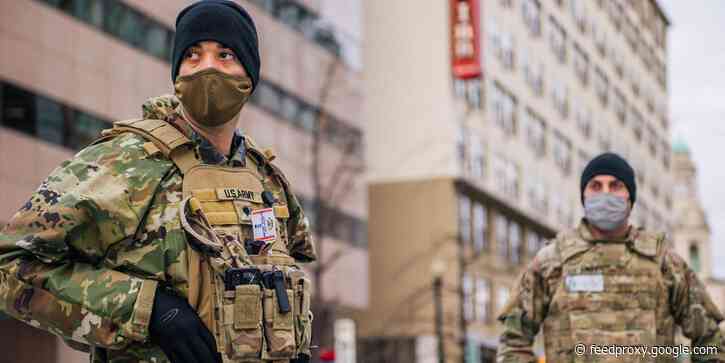 Photos show ramped-up troops and barriers locking down Washington, DC, ahead of Biden's inauguration