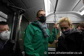 Kremlin critic Navalny detained after landing in Moscow - St Helens Star