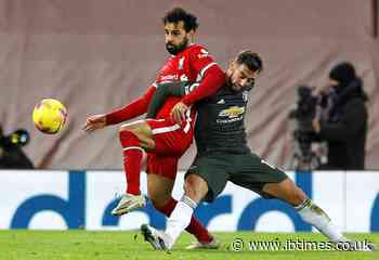 Manchester United misses chance to defeat Liverpool but stays on top of Premier League