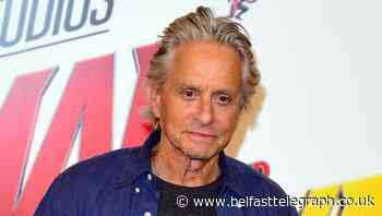 Michael Douglas meets his new grandson for the first time