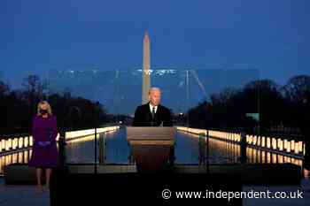 Biden and Harris lead Lincoln Memorial vigil for Covid victims as US death toll passes 400,000