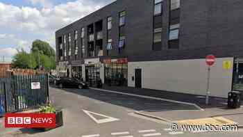 Covid: Ardwick health food store shut down after 20 people found inside - BBC News