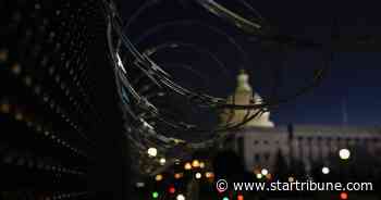 With Capitol on edge, inauguration gets underway