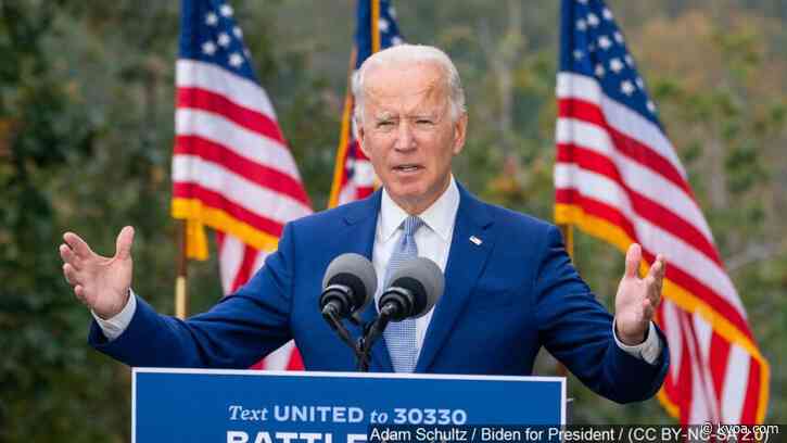 Biden signs executive orders on climate, virus